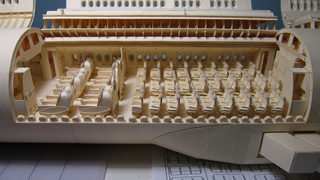 This meticulously crafted 777-replica is made of manila folders